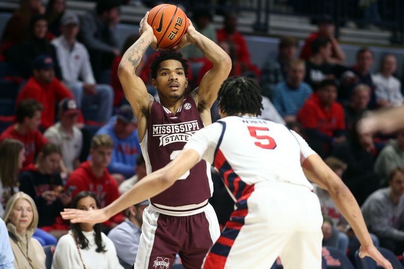 Feb 18, 2023; Oxford, Mississippi, USA; Mississippi State Bulldogs guard Shakeel Moore (3) handles the ball during the first half against the Mississippi Rebels at The Sandy and John Black Pavilion at Ole Miss. Mandatory Credit: Petre Thomas-USA TODAY Sports