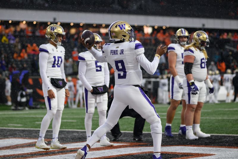 Nov 18, 2023; Corvallis, Oregon, USA; Washington Huskies quarterback Michael Penix Jr. (9) warms up pregame against the Oregon State Beavers at Reser Stadium. Mandatory Credit: Craig Strobeck-USA TODAY Sports