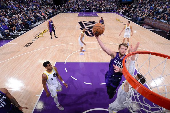 SACRAMENTO, CA - DECEMBER 16: Domantas Sabonis #10 of the Sacramento Kings drives to the basket during the game against the Utah Jazz on December 16, 2023 at Golden 1 Center in Sacramento, California. NOTE TO USER: User expressly acknowledges and agrees that, by downloading and or using this Photograph, user is consenting to the terms and conditions of the Getty Images License Agreement. Mandatory Copyright Notice: Copyright 2023 NBAE (Photo by Rocky Widner/NBAE via Getty Images)