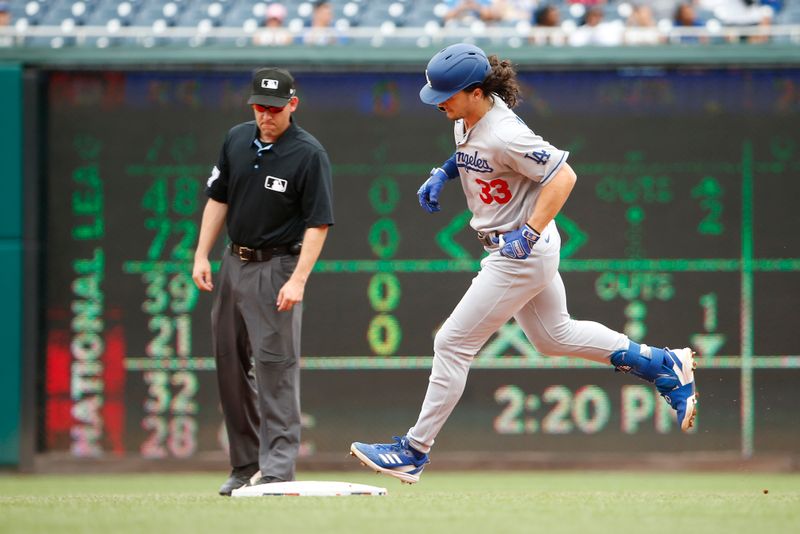 Sep 10, 2023; Washington, District of Columbia, USA; Los Angeles Dodgers center fielder James Outman (33) rounds the bases after hitting a home run in the second inning against the Washington Nationals at Nationals Park. Mandatory Credit: Amber Searls-USA TODAY Sports