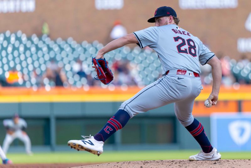 Jul 29, 2024; Detroit, Michigan, USA; Cleveland Guardians starting pitcher Tanner Bibee (28) delivers in the first inning against the Detroit Tigers at Comerica Park. Mandatory Credit: David Reginek-USA TODAY Sports