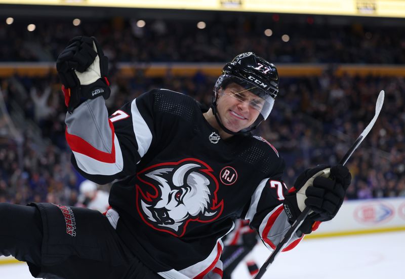 Jan 11, 2024; Buffalo, New York, USA;  Buffalo Sabres right wing JJ Peterka (77) celebrates is goal during the first period against the Ottawa Senators at KeyBank Center. Mandatory Credit: Timothy T. Ludwig-USA TODAY Sports