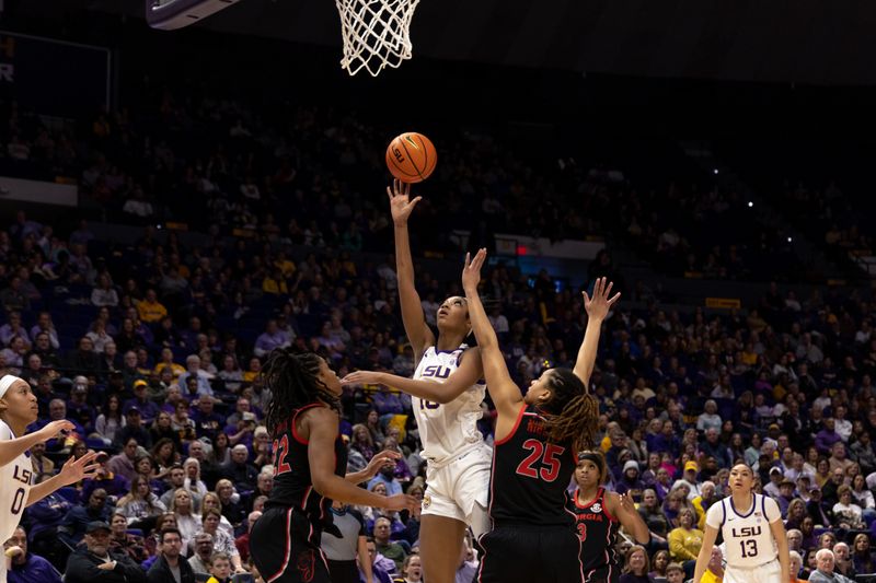 Feb 2, 2023; Baton Rouge, Louisiana, USA;  LSU Lady Tigers forward Angel Reese (10) shoots a jump shot against Georgia Lady Bulldogs forward Kari Niblack (25) during the first half at Pete Maravich Assembly Center. Mandatory Credit: Stephen Lew-USA TODAY Sports