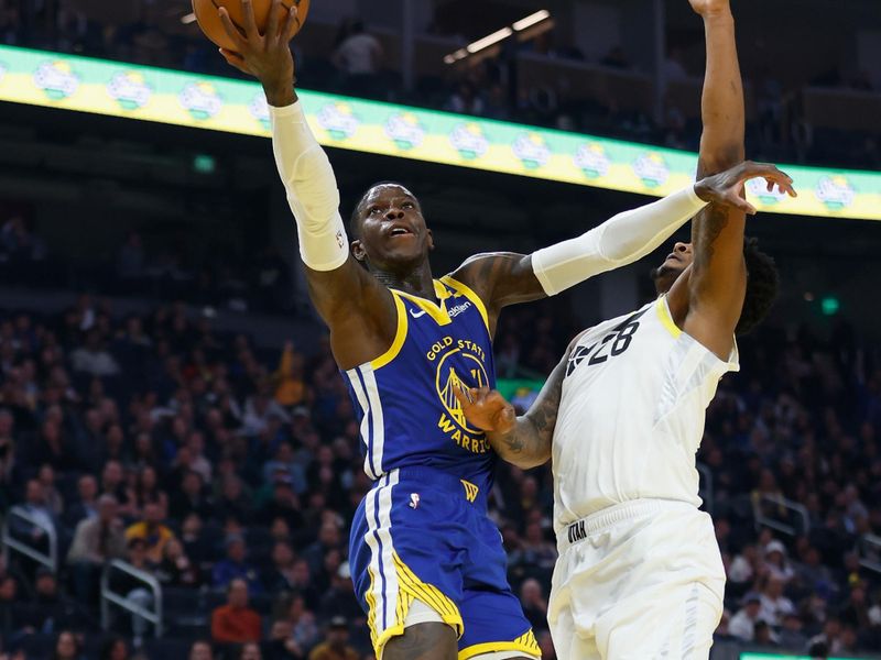 SAN FRANCISCO, CALIFORNIA - JANUARY 28: Dennis Schroder #71 of the Golden State Warriors goes to the basket against Brice Sensabaugh #28 of the Utah Jazz in the first quarter at Chase Center on January 28, 2025 in San Francisco, California. NOTE TO USER: User expressly acknowledges and agrees that, by downloading and or using this photograph, User is consenting to the terms and conditions of the Getty Images License Agreement. (Photo by Lachlan Cunningham/Getty Images)