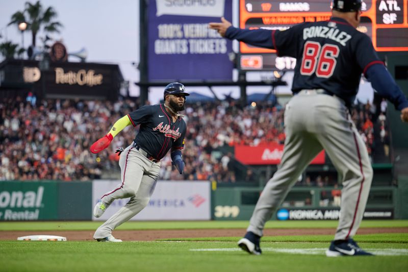 Jun 6, 2025; San Francisco, California, USA; Atlanta Braves designated hitter Marcell Ozuna Jr (20) runs toward home plate against the San Francisco Giants during the fourth inning at Oracle Park. Mandatory Credit: Robert Edwards-Imagn Images