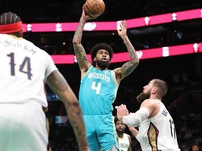 CHARLOTTE, NC - DECEMBER 15:  Nick Richards #4 of the Charlotte Hornets shoots the ball during the game against the New Orleans Pelicans on December 15, 2023 at Spectrum Center in Charlotte, North Carolina. NOTE TO USER: User expressly acknowledges and agrees that, by downloading and or using this photograph, User is consenting to the terms and conditions of the Getty Images License Agreement.  Mandatory Copyright Notice:  Copyright 2023 NBAE (Photo by Brock Williams-Smith/NBAE via Getty Images)