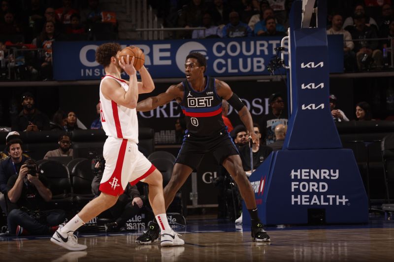 DETROIT, MI - JANUARY 12: Jalen Duren #0 of the Detroit Pistons plays defense during the game against the Houston Rockets on January 12, 2024 at Little Caesars Arena in Detroit, Michigan. NOTE TO USER: User expressly acknowledges and agrees that, by downloading and/or using this photograph, User is consenting to the terms and conditions of the Getty Images License Agreement. Mandatory Copyright Notice: Copyright 2024 NBAE (Photo by Brian Sevald/NBAE via Getty Images)