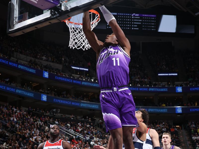 SALT LAKE CITY, UT - MARCH 4:  Kris Dunn #11 of the Utah Jazz drives to the basket during the game against the Washington Wizards on March 4, 2024 at vivint.SmartHome Arena in Salt Lake City, Utah. NOTE TO USER: User expressly acknowledges and agrees that, by downloading and or using this Photograph, User is consenting to the terms and conditions of the Getty Images License Agreement. Mandatory Copyright Notice: Copyright 2024 NBAE (Photo by Melissa Majchrzak/NBAE via Getty Images)