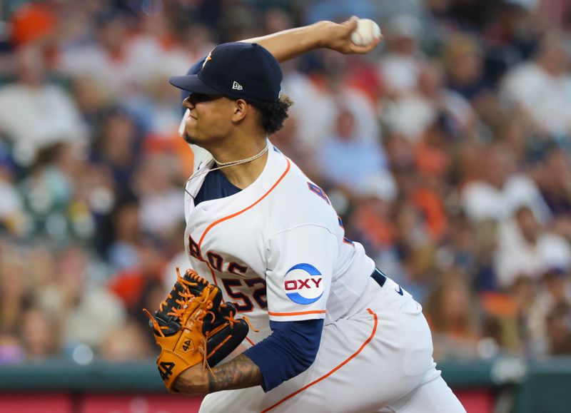 Aug 2, 2023; Houston, Texas, USA; Houston Astros relief pitcher Bryan Abreu (52) pitches against the Cleveland Guardians in the eighth inning at Minute Maid Park. Mandatory Credit: Thomas Shea-USA TODAY Sports