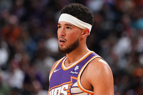 PHOENIX, AZ - NOVEMBER 2: Devin Booker #1 of the Phoenix Suns looks on during the game against the San Antonio Spurs on November 2, 2023 at Footprint Center in Phoenix, Arizona. NOTE TO USER: User expressly acknowledges and agrees that, by downloading and or using this photograph, user is consenting to the terms and conditions of the Getty Images License Agreement. Mandatory Copyright Notice: Copyright 2023 NBAE (Photo by Garrett Ellwood/NBAE via Getty Images)