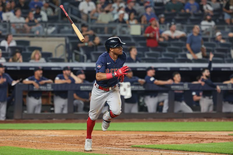 Jul 5, 2024; Bronx, New York, USA; Boston Red Sox center fielder Ceddanne Rafaela (43) hits a two run home run during the tenth inning against the New York Yankees at Yankee Stadium. Mandatory Credit: Vincent Carchietta-USA TODAY Sports