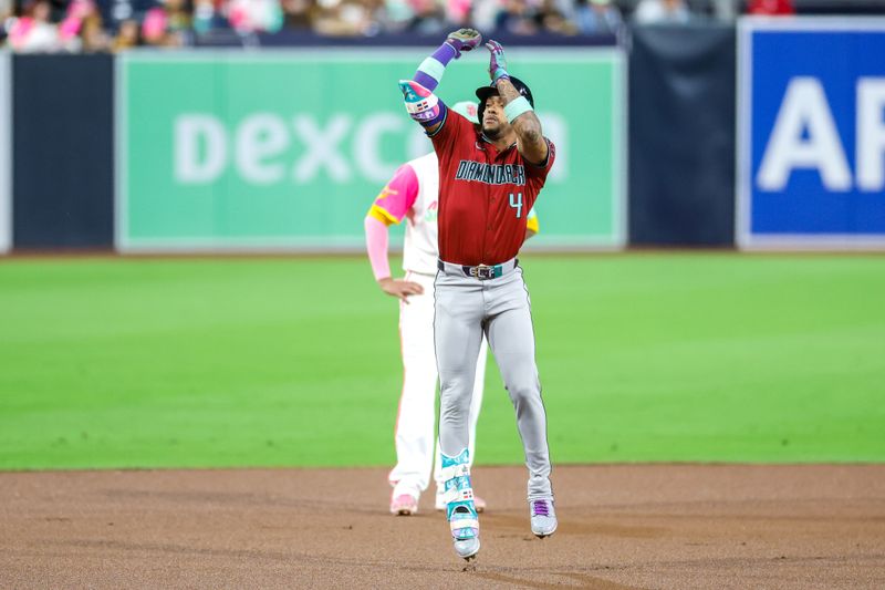 Sep 26, 2025; San Diego, California, USA; Arizona Diamondbacks second baseman Ketel Marte (4) celebrates after hitting a one run home run during the first inning against the San Diego Padres at Petco Park. Mandatory Credit: David Frerker-Imagn Images