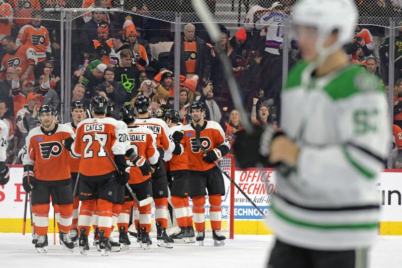 Jan 18, 2024; Philadelphia, Pennsylvania, USA; Philadelphia Flyers celebrate win against the Dallas Stars at Wells Fargo Center. Mandatory Credit: Eric Hartline-USA TODAY Sports