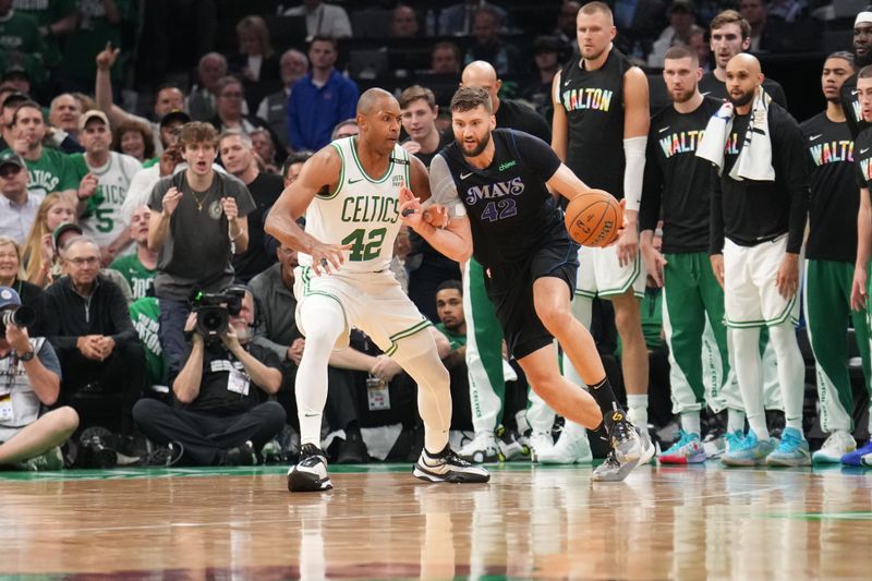 BOSTON, MA - JUNE 6: Maxi Kleber #42 of the Dallas Mavericks dribbles the ball during the game against the Boston Celtics during Game 1 of the 2024 NBA Finals on June 6, 2024 at the TD Garden in Boston, Massachusetts. NOTE TO USER: User expressly acknowledges and agrees that, by downloading and or using this photograph, User is consenting to the terms and conditions of the Getty Images License Agreement. Mandatory Copyright Notice: Copyright 2024 NBAE  (Photo by Jesse D. Garrabrant/NBAE via Getty Images)