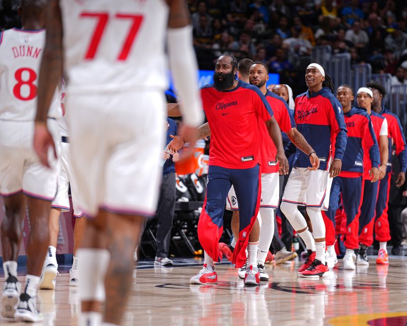 DENVER, CO - OCTOBER 26: James Harden #1 of the LA Clippers high fives teammates during the game against the Denver Nuggets on October 26, 2024 at the Ball Arena in Denver, Colorado. NOTE TO USER: User expressly acknowledges and agrees that, by downloading and/or using this Photograph, user is consenting to the terms and conditions of the Getty Images License Agreement. Mandatory Copyright Notice: Copyright 2024 NBAE (Photo by Garrett Ellwood/NBAE via Getty Images)