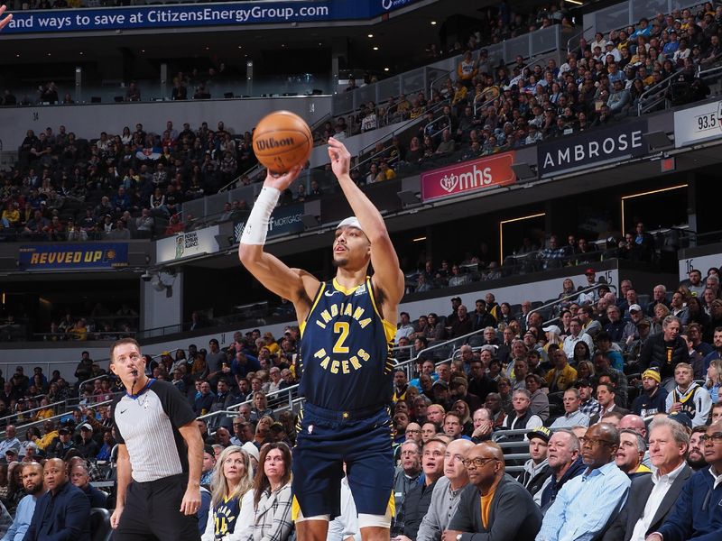 INDIANAPOLIS, IN - JANUARY 23: Andrew Nembhard #2 of the Indiana Pacers shoots a three point basket during the game against the Denver Nuggets on January 23, 2024 at Gainbridge Fieldhouse in Indianapolis, Indiana. NOTE TO USER: User expressly acknowledges and agrees that, by downloading and or using this Photograph, user is consenting to the terms and conditions of the Getty Images License Agreement. Mandatory Copyright Notice: Copyright 2024 NBAE (Photo by Ron Hoskins/NBAE via Getty Images)