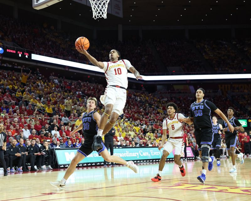 Mar 6, 2024; Ames, Iowa, USA; Iowa State Cyclones guard Keshon Gilbert (10) scores against the Brigham Young Cougars at James H. Hilton Coliseum. Mandatory Credit: Reese Strickland-USA TODAY Sports

