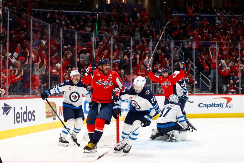 Mar 24, 2024; Washington, District of Columbia, USA; Washington Capitals left wing Alex Ovechkin (8) celebrates after scoring a goal against the Winnipeg Jets during the third period at Capital One Arena. Mandatory Credit: Amber Searls-USA TODAY Sports