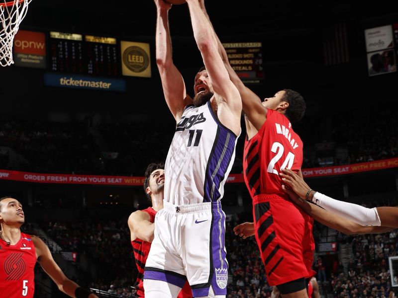 PORTLAND, OR - NOVEMBER 29: Domantas Sabonis #11 of the Sacramento Kings drives to the basket during the game against the Portland Trail Blazers during the Emirates NBA Cup on November 29, 2024 at the Moda Center Arena in Portland, Oregon. NOTE TO USER: User expressly acknowledges and agrees that, by downloading and or using this photograph, user is consenting to the terms and conditions of the Getty Images License Agreement. Mandatory Copyright Notice: Copyright 2024 NBAE (Photo by Cameron Browne/NBAE via Getty Images)