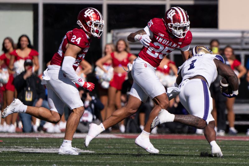 Oct 26, 2024; Bloomington, Indiana, USA; Washington Huskies running back Jonah Coleman (1) is tackled by Indiana Hoosiers defensive back Amare Ferrell (25) during the second quarter at Memorial Stadium. Mandatory Credit: Jacob Musselman-Imagn Images