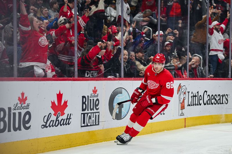 Apr 4, 2025; Detroit, Michigan, USA; Detroit Red Wings right wing Patrick Kane (88) as fans celebrate his goal during the second period against the Carolina Hurricanes at Little Caesars Arena. Mandatory Credit: Tim Fuller-Imagn Images