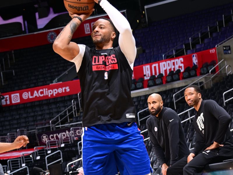 LOS ANGELES, CA - MARCH 27: John Wall #11 of the LA Clippers warms up prior to the game against the Chicago Bulls on March 27, 2023 at Crypto.Com Arena in Los Angeles, California. NOTE TO USER: User expressly acknowledges and agrees that, by downloading and/or using this Photograph, user is consenting to the terms and conditions of the Getty Images License Agreement. Mandatory Copyright Notice: Copyright 2023 NBAE (Photo by Adam Pantozzi/NBAE via Getty Images)