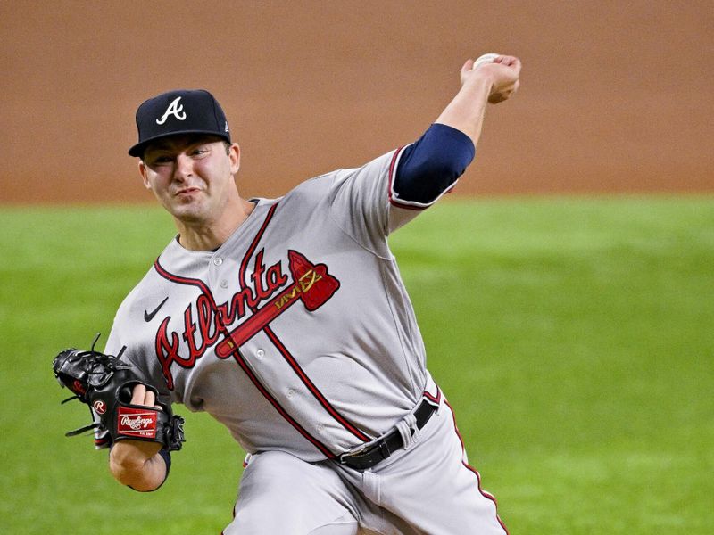 May 16, 2023; Arlington, Texas, USA; Atlanta Braves starting pitcher Jared Shuster (45) pitches against the Texas Rangers during the first inning at Globe Life Field. Mandatory Credit: Jerome Miron-USA TODAY Sports