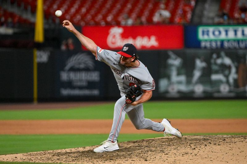 Jul 10, 2025; St. Louis, Missouri, USA;  Washington Nationals relief pitcher Kyle Finnegan (67) pitches against the St. Louis Cardinals during the eighth inning at Busch Stadium. Mandatory Credit: Jeff Curry-Imagn Images
