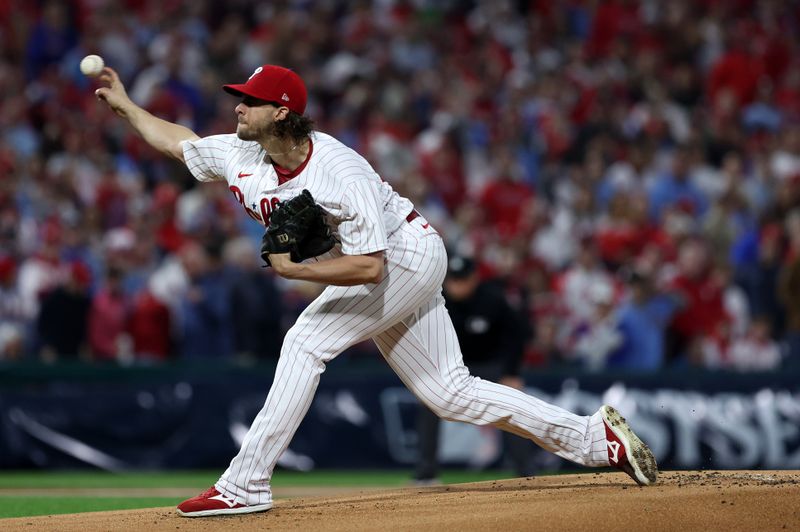 Oct 17, 2023; Philadelphia, Pennsylvania, USA; Philadelphia Phillies starting pitcher Aaron Nola (27) throws a pitch against the Arizona Diamondbacks in the first inning for game two of the NLCS for the 2023 MLB playoffs at Citizens Bank Park. Mandatory Credit: Bill Streicher-USA TODAY Sports