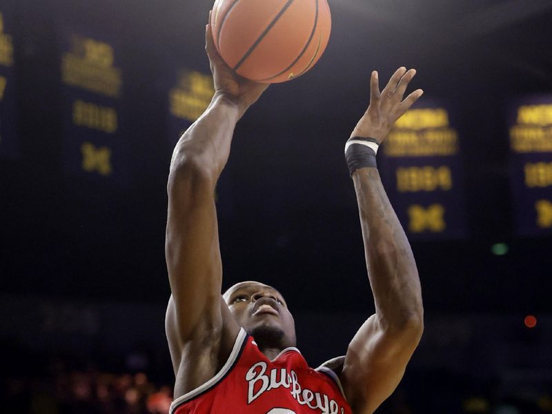 Jan 15, 2024; Ann Arbor, Michigan, USA; Ohio State Buckeyes center Felix Okpara (34) shoots in the second half against the Michigan Wolverines at Crisler Center. Mandatory Credit: Rick Osentoski-USA TODAY Sports