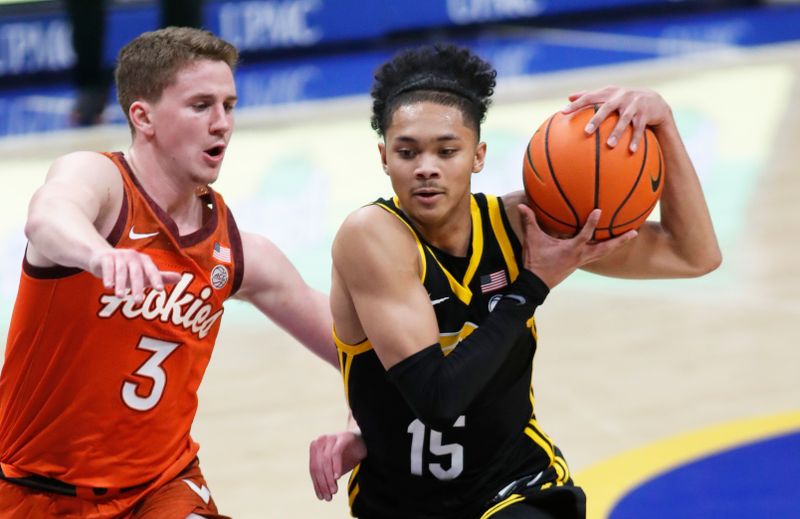 Feb 24, 2024; Pittsburgh, Pennsylvania, USA;  Pittsburgh Panthers guard Jaland Lowe (15) drives to the basket against Virginia Tech Hokies guard Sean Pedulla (3) during the second half at the Petersen Events Center. The Panthers won 79-64. Mandatory Credit: Charles LeClaire-USA TODAY Sports