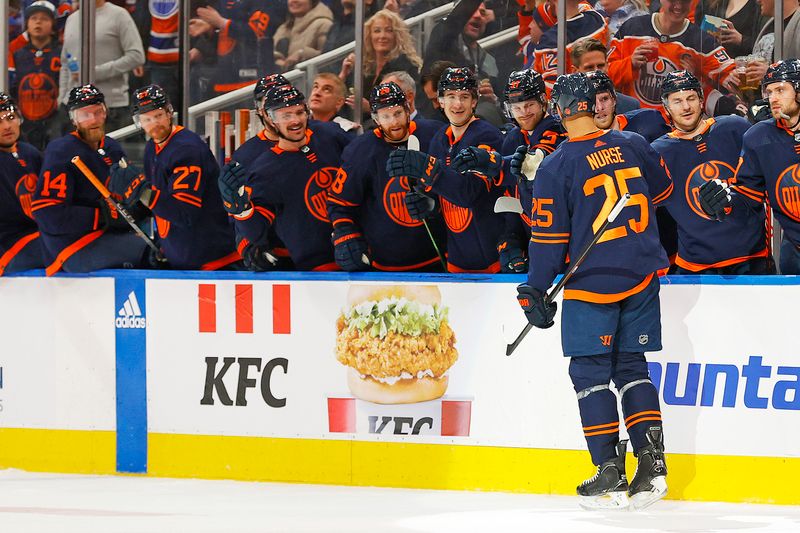 Mar 21, 2024; Edmonton, Alberta, CAN; The Edmonton Oilers celebrate a goal scored by defensemen Darnell Nurse (25) during the third period against the Buffalo Sabres at Rogers Place. Mandatory Credit: Perry Nelson-USA TODAY Sports