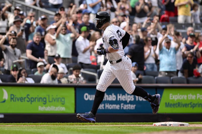 Jul 21, 2024; Bronx, New York, USA; New York Yankees outfielder Aaron Judge (99) rounds the bases after hitting a three-run home run against the Tampa Bay Rays during the seventh inning at Yankee Stadium. Mandatory Credit: John Jones-USA TODAY Sports