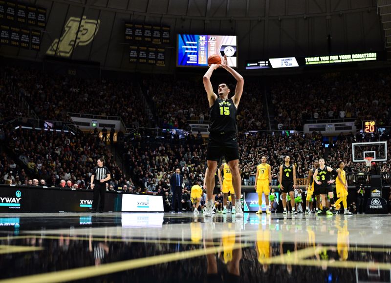 Jan 23, 2024; West Lafayette, Indiana, USA; Purdue Boilermakers center Zach Edey (15) shoots a free throw after a flagrant fowl during the second half against the Michigan Wolverines at Mackey Arena. Mandatory Credit: Marc Lebryk-USA TODAY Sports