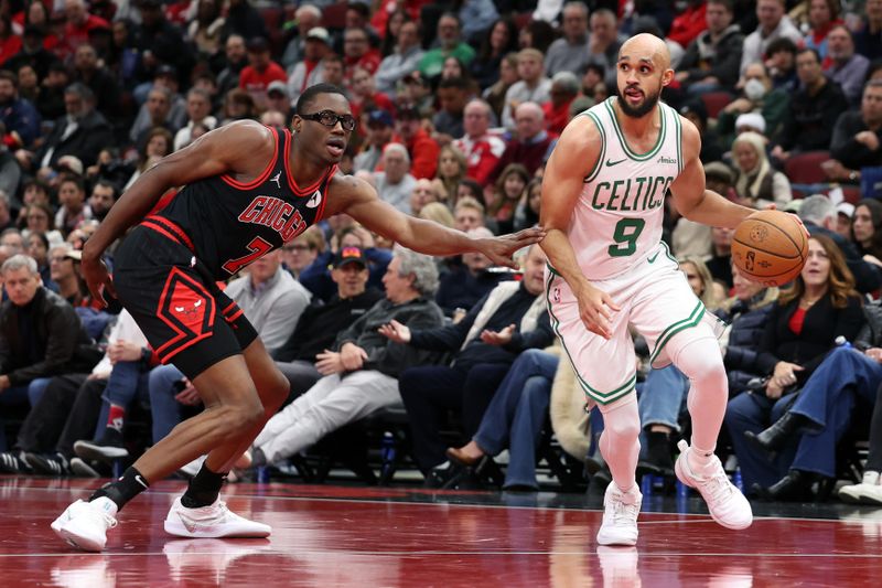 CHICAGO, ILLINOIS - NOVEMBER 29: Derrick White #9 of the Boston Celtics dribbles the ball against Jalen Smith #7 of the Chicago Bulls during the second quarter of the Emirates NBA Cup game at the United Center on November 29, 2024 in Chicago, Illinois. NOTE TO USER: User expressly acknowledges and agrees that, by downloading and or using this photograph, User is consenting to the terms and conditions of the Getty Images License Agreement.  (Photo by Luke Hales/Getty Images)