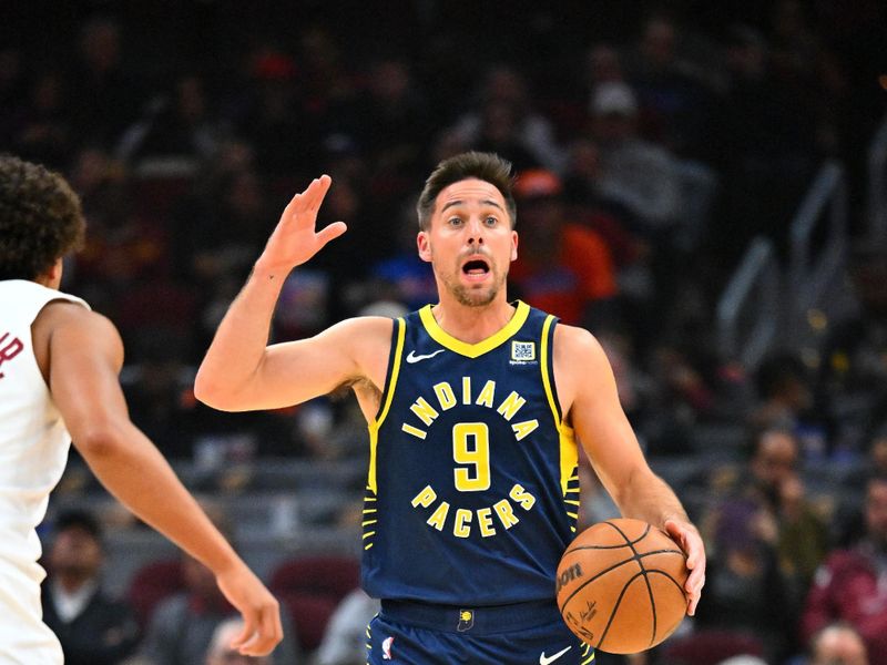 CLEVELAND, OHIO - OCTOBER 10: T.J. McConnell #9 of the Indiana Pacers yells to his teammates as he brings the ball up court during the first half against the Cleveland Cavaliers of a preseason game at Rocket Mortgage Fieldhouse on October 10, 2024 in Cleveland, Ohio. NOTE TO USER: User expressly acknowledges and agrees that, by downloading and or using this photograph, User is consenting to the terms and conditions of the Getty Images License Agreement. (Photo by Jason Miller/Getty Images)