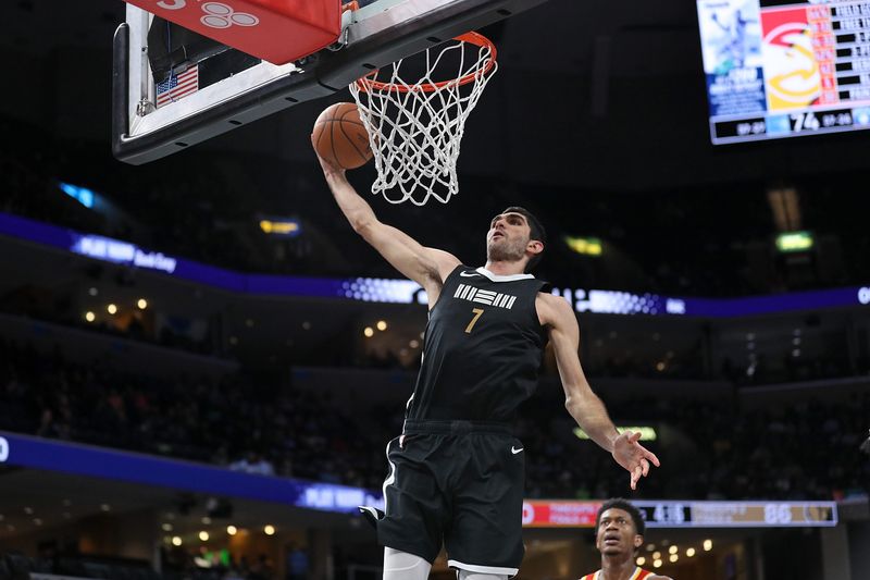 MEMPHIS, TENNESSEE - MARCH 08: Santi Aldama #7 of the Memphis Grizzlies goes to the basket during the second half against the Atlanta Hawks at FedExForum on March 08, 2024 in Memphis, Tennessee. NOTE TO USER: User expressly acknowledges and agrees that, by downloading and or using this photograph, User is consenting to the terms and conditions of the Getty Images License Agreement. (Photo by Justin Ford/Getty Images)