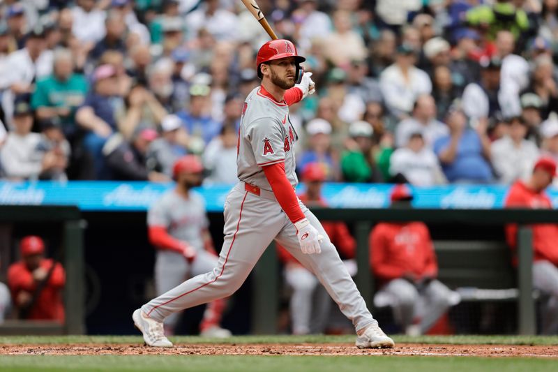Jun 1, 2024; Seattle, Washington, USA;  Los Angeles Angels left fielder Taylor Ward reacts as he strikes out against the Seattle Mariners during the third inning at T-Mobile Park. Mandatory Credit: John Froschauer-USA TODAY Sports