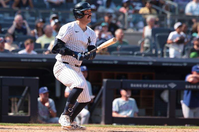 Aug 11, 2024; Bronx, New York, USA; New York Yankees catcher Austin Wells (28) doubles during the seventh inning against the Texas Rangers at Yankee Stadium. Mandatory Credit: Vincent Carchietta-USA TODAY Sports