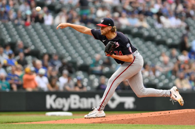 Jun 27, 2023; Seattle, Washington, USA; Washington Nationals starting pitcher Jake Irvin (74) pitches to the Seattle Mariners during the first inning at T-Mobile Park. Mandatory Credit: Steven Bisig-USA TODAY Sports