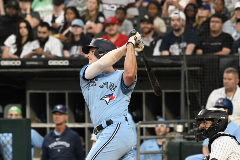 Jul 6, 2023; Chicago, Illinois, USA;  Toronto Blue Jays third baseman Matt Chapman (26) hits a double against the Chicago White Sox during the first inning at Guaranteed Rate Field. Mandatory Credit: Matt Marton-USA TODAY Sports