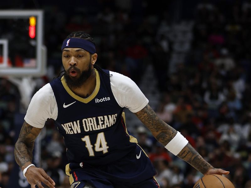 NEW ORLEANS, LOUISIANA - MARCH 13: Brandon Ingram #14 of the New Orleans Pelicans drives the ball up the court against the Cleveland Cavaliers at Smoothie King Center on March 13, 2024 in New Orleans, Louisiana.   NOTE TO USER: User expressly acknowledges and agrees that, by downloading and or using this photograph, User is consenting to the terms and conditions of the Getty Images License Agreement.  (Photo by Chris Graythen/Getty Images)