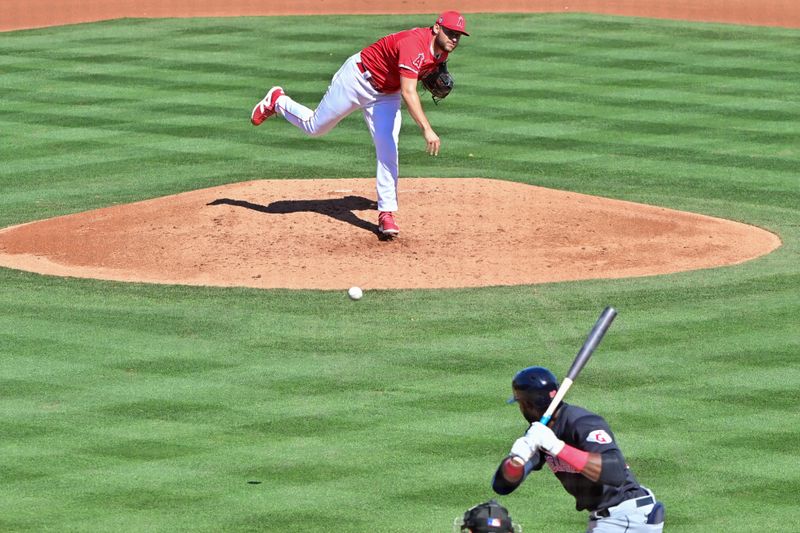 Feb 29, 2024; Tempe, Arizona, USA;  Los Angeles Angels starting pitcher Chase Silseth (63) throws to Cleveland Guardians right fielder Estevan Florial (90) in the fourth inning during a spring training game at Tempe Diablo Stadium. Mandatory Credit: Matt Kartozian-USA TODAY Sports