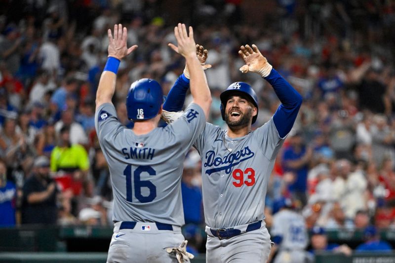 Aug 16, 2024; St. Louis, Missouri, USA;  Los Angeles Dodgers center fielder Kevin Kiermaier (93) celebrates with catcher Will Smith (16) after hitting a three run home run against the St. Louis Cardinals during the sixth inning at Busch Stadium. Mandatory Credit: Jeff Curry-USA TODAY Sports