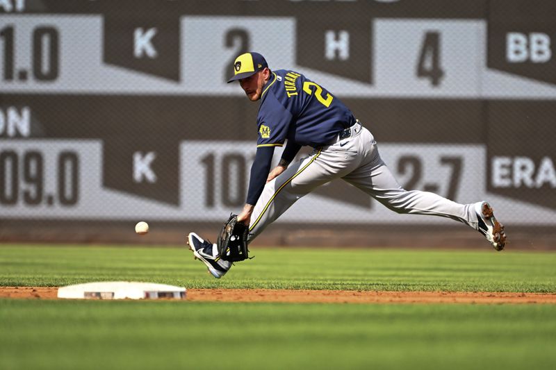 Aug 3, 2024; Washington, District of Columbia, USA;  Milwaukee Brewers second baseman Brice Turang (2) makes a play on a ground ball against the Washington Nationals during the second inning at Nationals Park. Mandatory Credit: Rafael Suanes-USA TODAY Sports