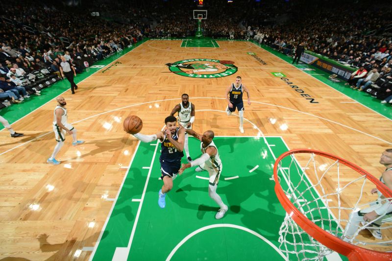 BOSTON, MA - JANUARY 19:  Jamal Murray #27 of the Denver Nuggets drives to the basket during the game aBoston Celtics on January 19, 2024 at the TD Garden in Boston, Massachusetts. NOTE TO USER: User expressly acknowledges and agrees that, by downloading and or using this photograph, User is consenting to the terms and conditions of the Getty Images License Agreement. Mandatory Copyright Notice: Copyright 2024 NBAE  (Photo by Brian Babineau/NBAE via Getty Images)