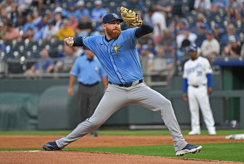 Jul 2, 2024; Kansas City, Missouri, USA; Tampa Bay Rays starting pitcher Zack Littell (52) delivers a pitch against the Kansas City Royals in the first inning at Kauffman Stadium. Mandatory Credit: Peter Aiken-USA TODAY Sports