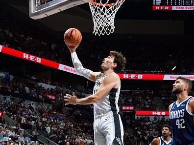 SAN ANTONIO, TX - OCTOBER 25: Cedi Osman #16 of the San Antonio Spurs shoots the ball during the game against the Dallas Mavericks on October 25, 2023 at the Frost Bank Center in San Antonio, Texas. NOTE TO USER: User expressly acknowledges and agrees that, by downloading and or using this photograph, user is consenting to the terms and conditions of the Getty Images License Agreement. Mandatory Copyright Notice: Copyright 2023 NBAE (Photos by Michael Gonzales/NBAE via Getty Images)