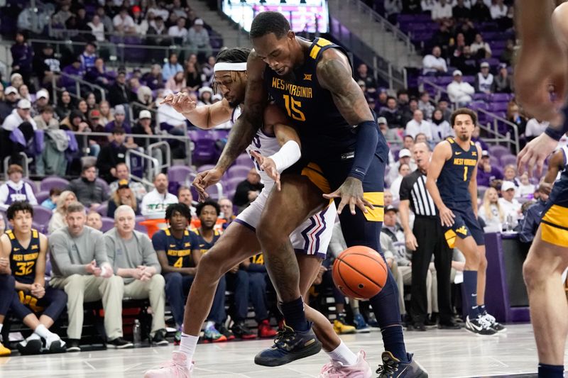 Jan 31, 2023; Fort Worth, Texas, USA; TCU Horned Frogs forward Xavier Cork (12) and West Virginia Mountaineers forward Jimmy Bell Jr. (15) go after a loose ball during the first half at Ed and Rae Schollmaier Arena. Mandatory Credit: Chris Jones-USA TODAY Sports