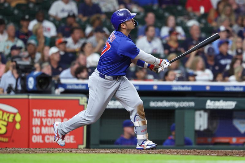 Jun 28, 2025; Houston, Texas, USA; Chicago Cubs designated hitter Seiya Suzuki (27) hits a home run during the eighth inning against the Houston Astros at Daikin Park. Mandatory Credit: Troy Taormina-Imagn Images
